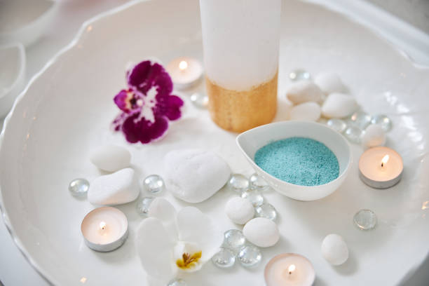 istock Orchids and accessories for spa procedure on white plate 1277915474