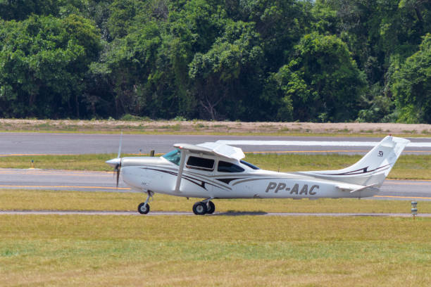 Cessna R182 Skylane RG (PP-AAC) Santarem/Para/Brazil - Sep 29, 2020: Cessna R182 Skylane RG (PP-AAC), private single-engine taxiing after landing at Santarem Airport (SBSN). stm photos stock pictures, royalty-free photos & images