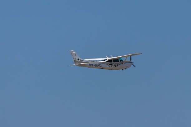 Cessna R182 Skylane RG (PP-AAC) Santarem/Para/Brazil - Sep 29, 2020: Cessna R182 Skylane RG (PP-AAC), private single engine taking off from Santarem Airport (SBSN). stm photos stock pictures, royalty-free photos & images