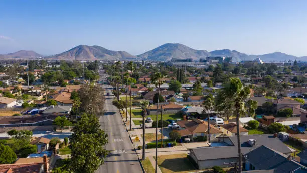 Daytime aerial view of the city center of Fontana, California.