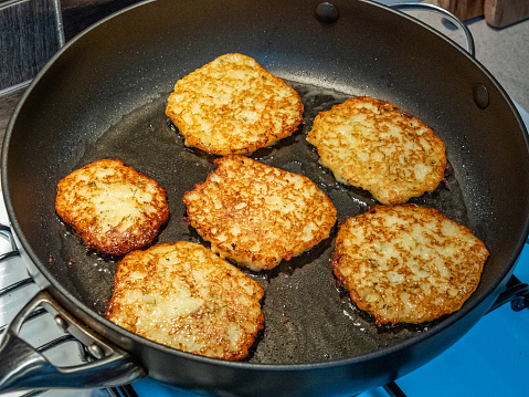 Polish potato pancakes, known as placki kartoflane or placki ziemniaczane in Polish, are delicious and delightful.