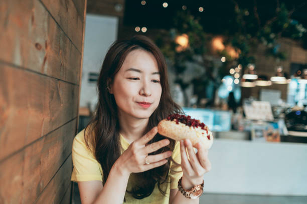 istock Woman enjoying breakfast 1277926154