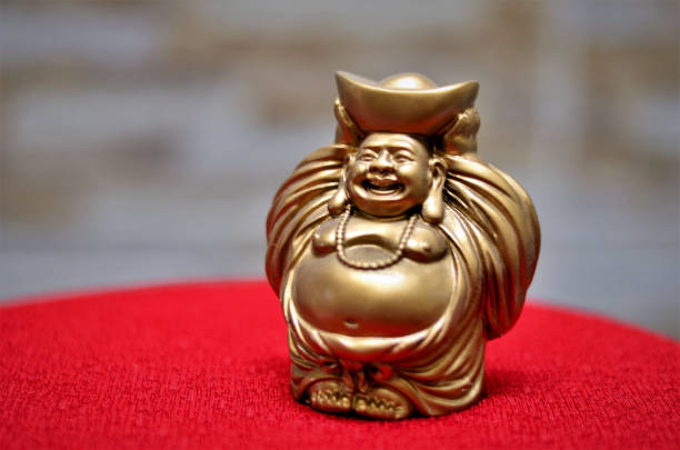 istock Prosperity Buddha Maitreya Gold 1277927258