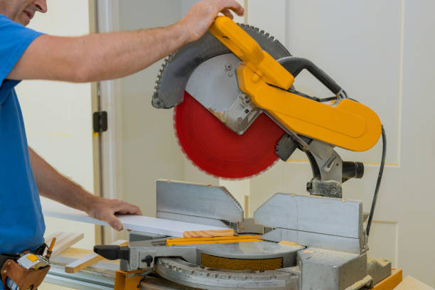 istock Close up of Circular saw cutting sharp rotary blade new baseboard woodwork 1277932870
