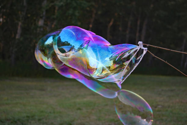 istock Iridescent bubble floating in the air 1277932911