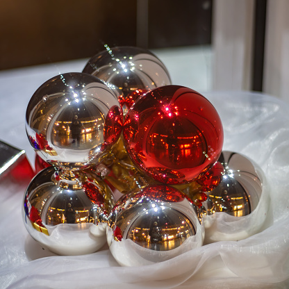 Shiny silver and red color new year balls