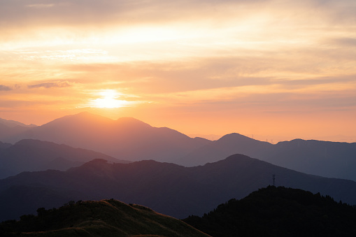 View of a sunset from the top of a mountain in Japan