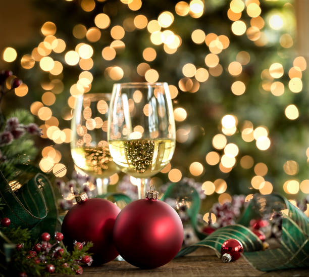 istock Christmas white wine in front of a Christmas tree 1277936350