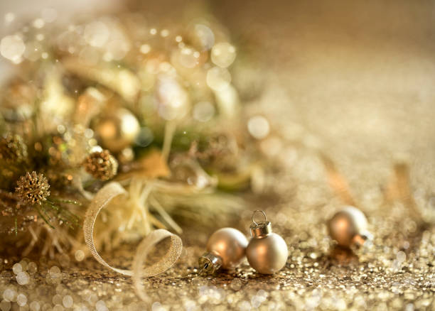 istock Christmas Gold Ornaments Background 1277940125