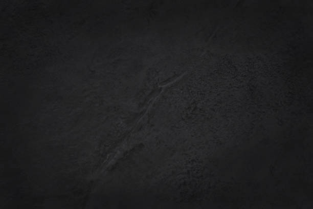 istock Dark grey black slate texture in natural pattern with high resolution for background and design art work. Black stone wall. 1277948049