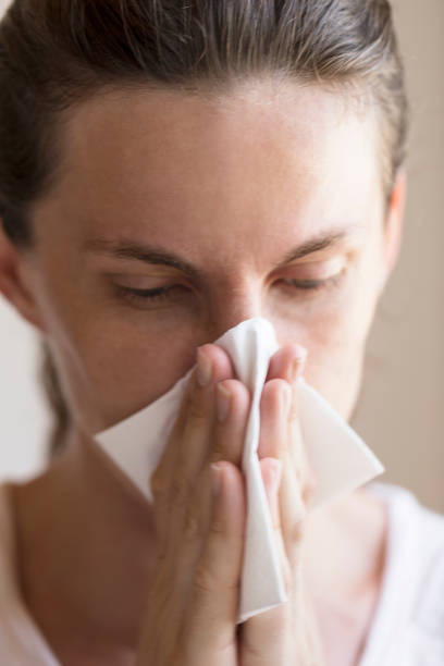 istock Women Cleaning Her Nose 1277959611