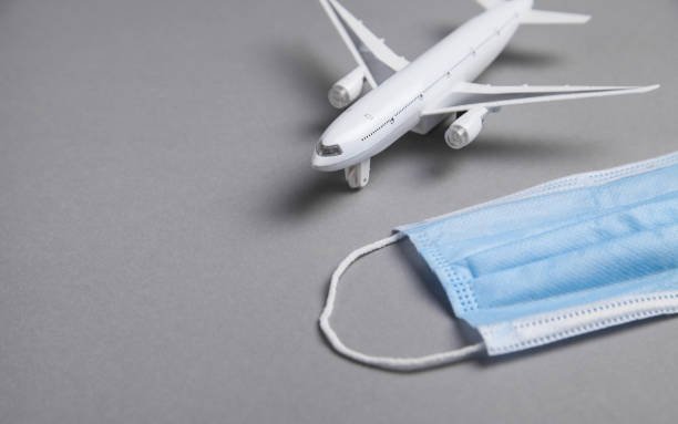 istock Face mask and airplane. Tourism and Coronavirus 1277959899