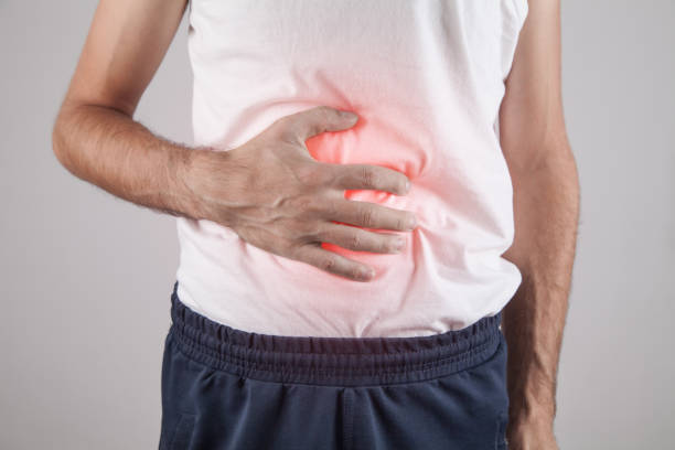 istock Caucasian man suffering from belly pain. 1277959912