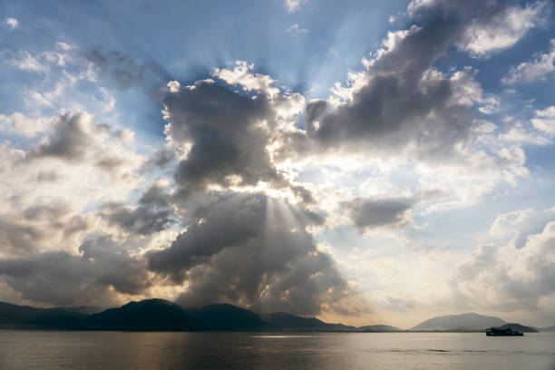 istock Sunlight through the clouds at dawn, island Koh Samui, Thailand 1277960738