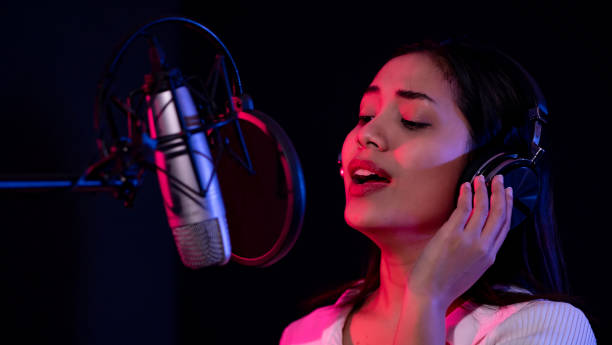 istock Young Asian women are enjoying singing 1277962095