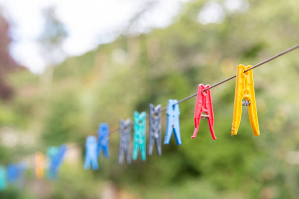 Multicolored clothespin in a garden