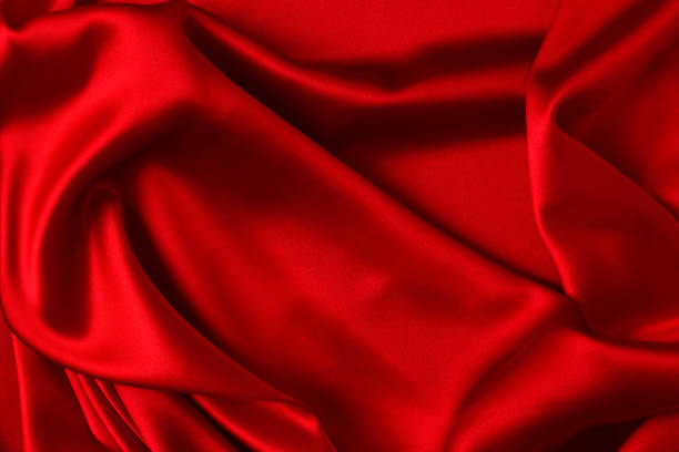 istock Red silk or satin luxury fabric texture can use as abstract background. Top view 1277964245