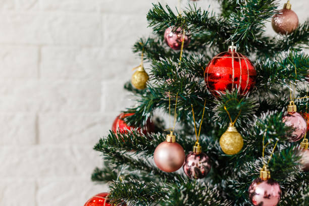 istock Christmas time lit only by the fire and Christmas tree. 1277966405