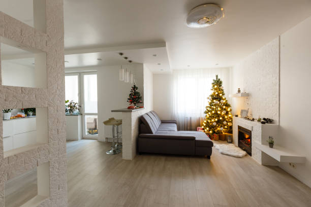 istock Christmas interior panorama, Christmas tree in the apartment 1277970139