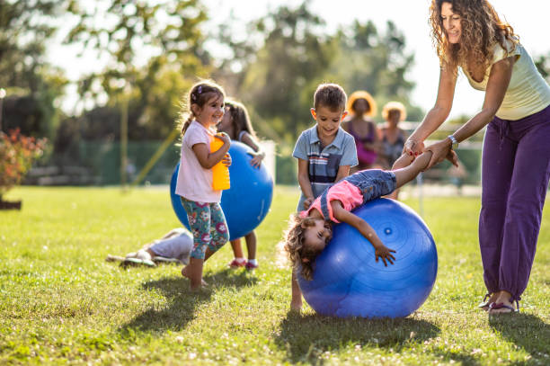 istock Group of kids playing in nature 1277970494