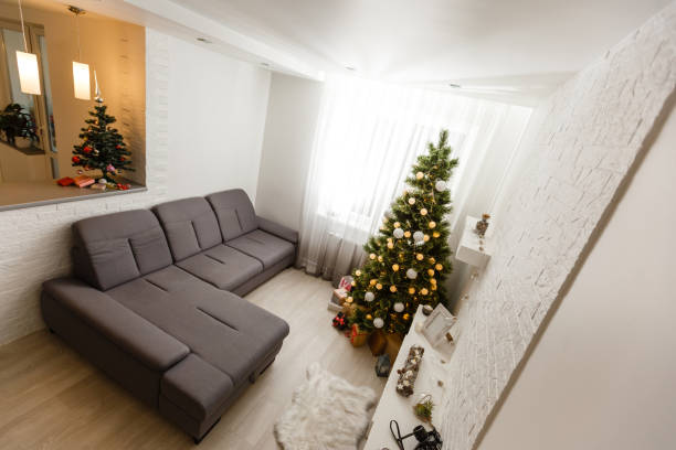 istock Christmas interior panorama, Christmas tree in the apartment 1277970518
