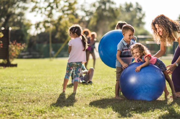 istock Group of kids playing in nature 1277970623