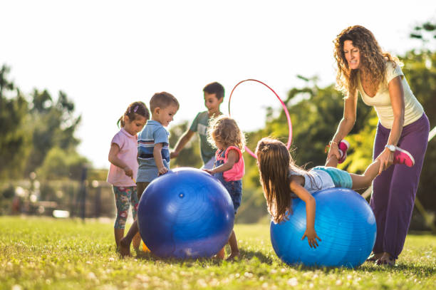 istock Group of kids playing in nature 1277971292