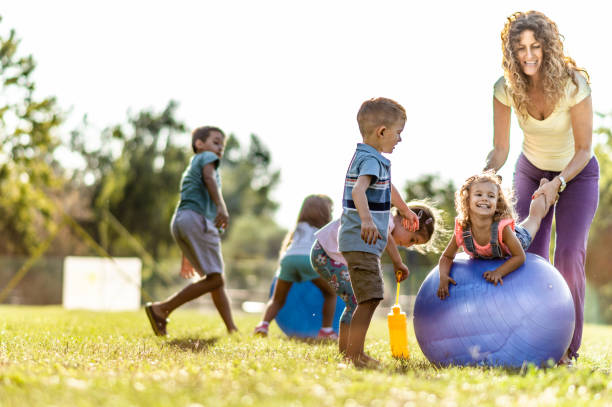 istock Group of kids playing in nature 1277972291