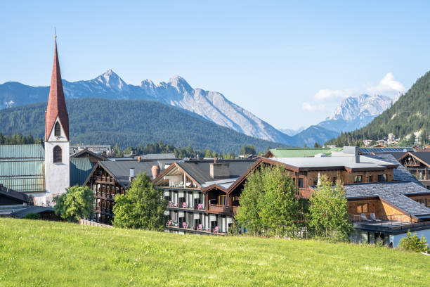 istock Alpine landscape with Parish Church, Seefeld, Austria 1277973076