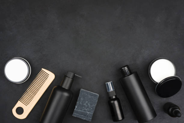 istock Male cosmetic set top view on dark background with space 1277977694