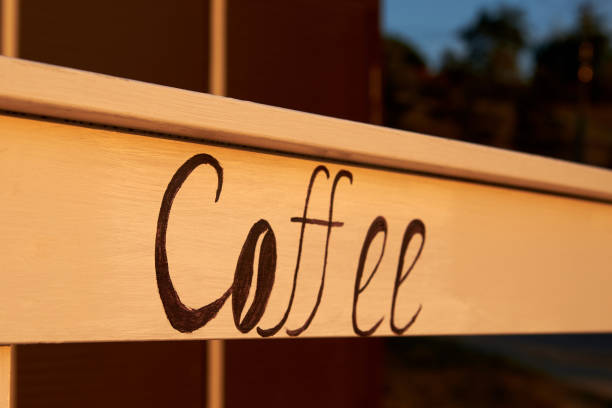 istock The word Coffee is written on a wooden plank. 1277979425
