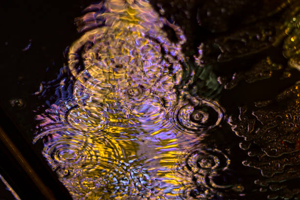 istock Ripples of water on plastic roof viewed from underneath 1277983404
