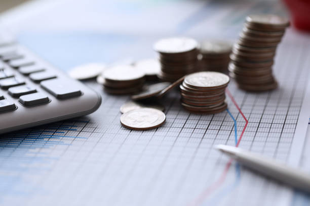 Close up of female accountant or banker making calculations