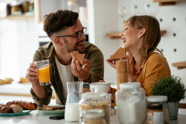 istock Young couple making sandwich at home. 1277984773