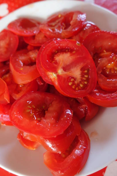 istock Tomatoes cut into slices  Cooking Preparation 1277984838