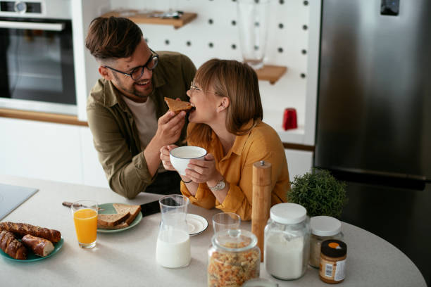 istock Young couple making sandwich at home. 1277985008
