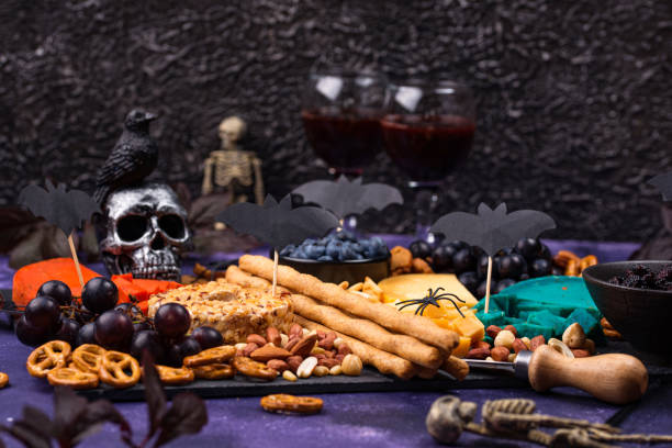istock Cheese plate with berries, grapes, nuts and snacks. 1277985368