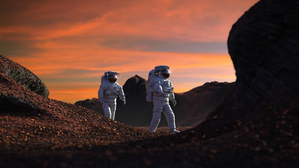 istock astronauts on Mars, travelers exploring the landscape on the red planet 1277986426