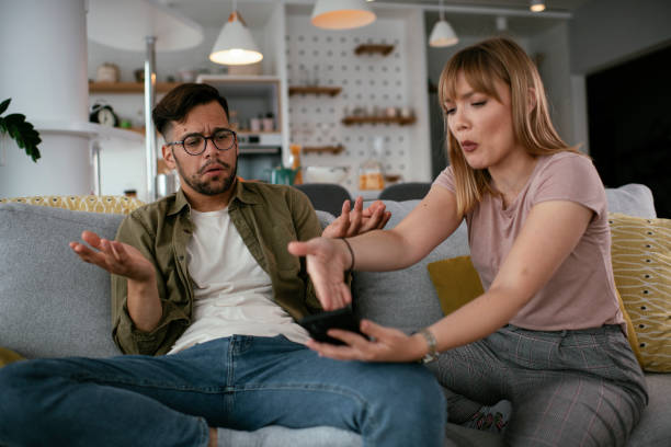 istock Boyfriend and girlfriend are arguing on the couch. 1277986575