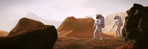 istock astronauts on Mars, travelers exploring the landscape on the red planet 1277986593