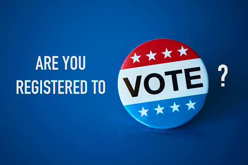 question are you registered to vote?, with a vote badge for the United States election on a blue background