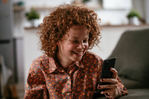 istock Beautiful woman having video call. 1277991470