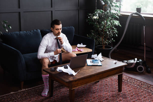 istock Businessman without pants during job interview or online meeting during distant work from home 1277991895