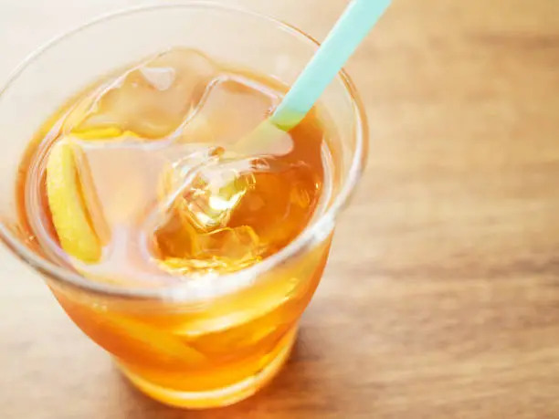 Photo of Glass of lemon ice tea