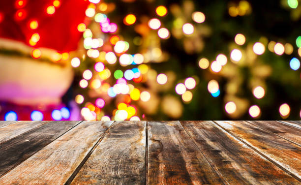 istock Empty of wood table top with blurred light gold bokeh abstract background. 1277994648