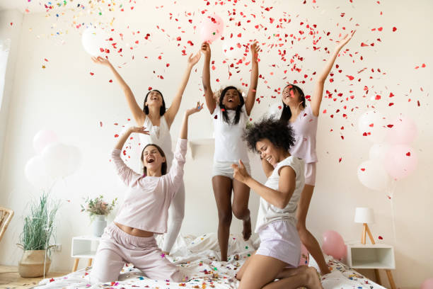 istock Overjoyed young festive multiracial women enjoying party. 1277996498