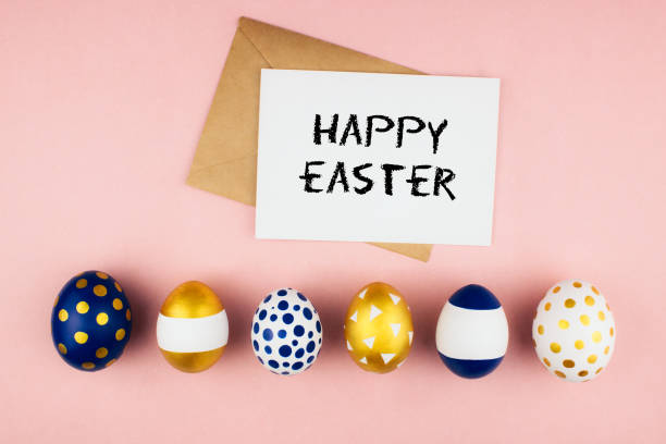 istock Modern golden blue spring easter eggs, envelope and letter with happy easter phrase flat lay on colorful pink background top view copy space. Easter celebration concept template. Stock photo. 1278005853