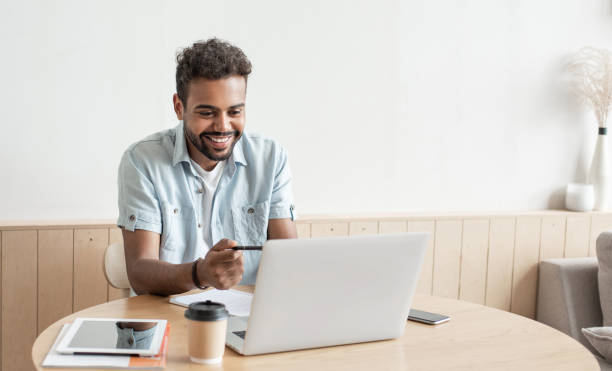 istock Young man having meeting online 1278009602