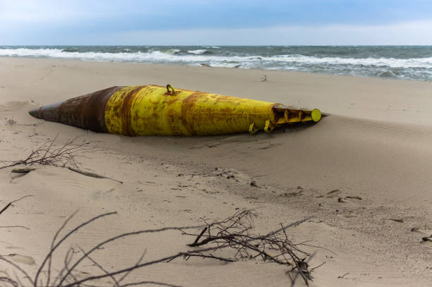 istock sea buoy made of iron, old iron float on the shore 1278009664