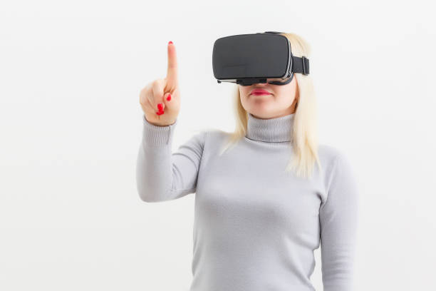 istock Woman using the virtual reality headset, virtual glasses 1278017337